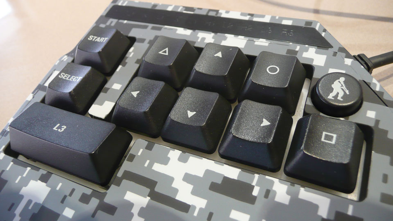 Illustration for article titled Hori's TAC3 Brings a Mouse and (Tiny) Keyboard to the PS3